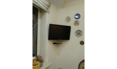 как правильно расположить телевизор на стене